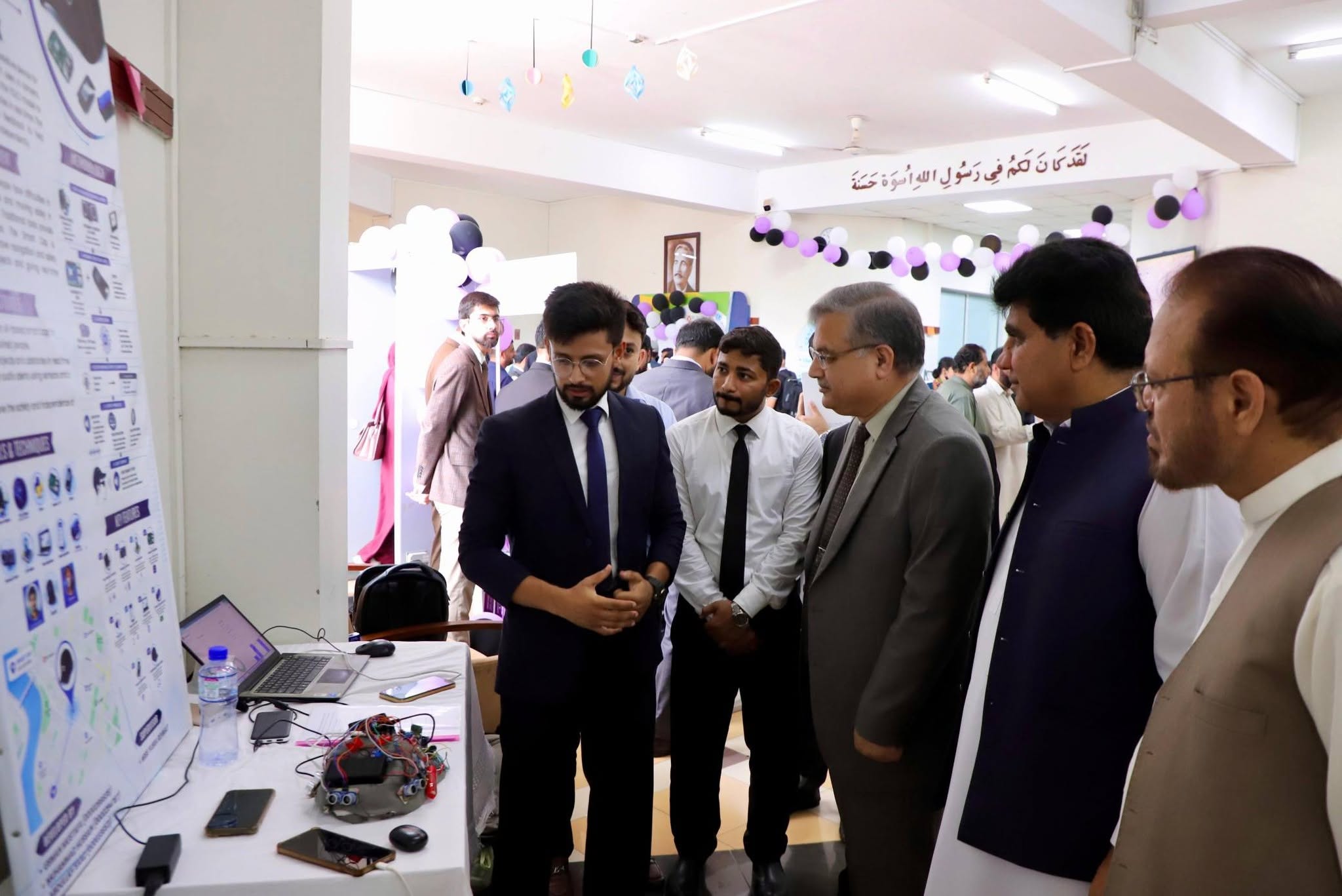 Students networking at the AIOU Job Fair